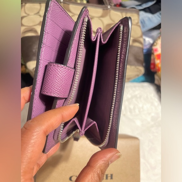 Coach Metallic Purple Wallet
$45 $165 - Picture 8 of 9